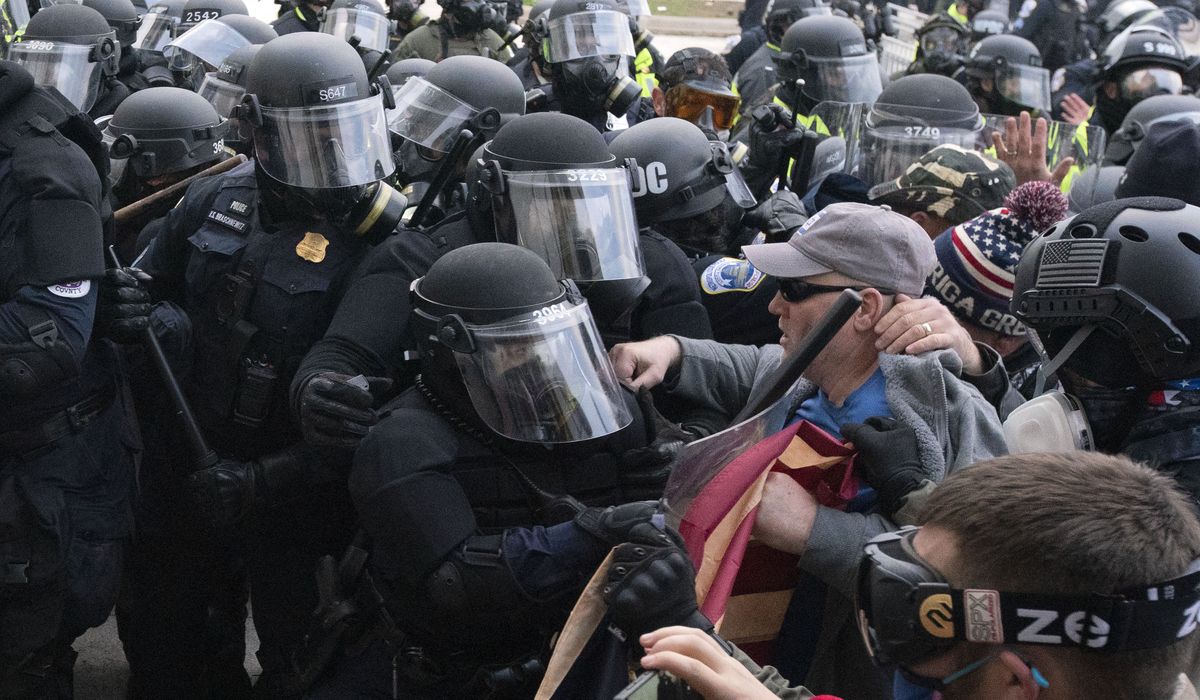 Widow of D.C. police officer sues suspected Capitol rioters
over husband's suicide 1
