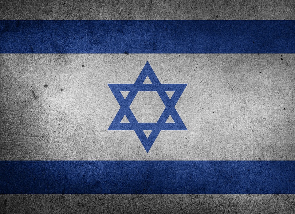 Coronavirus cases spike in highly vaccinated Israel but drop
in unvaccinated Palestine 1