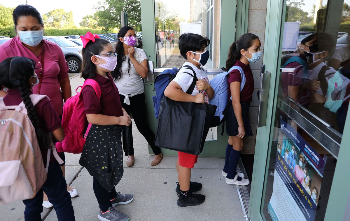 CPS reopening: Worries, excitement, busing woes mark first
day as schools reopen fully 1 CPS reopening: Worries, excitement, busing woes mark first
day as schools reopen fully 1