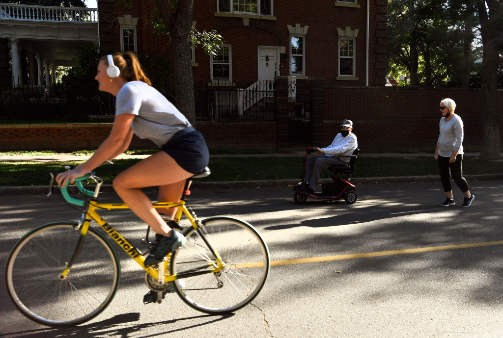 Denver to begin reopening some shared streets to
cars 1
