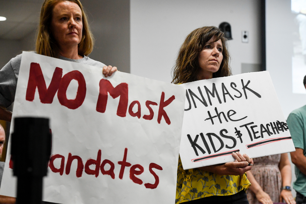 Douglas County school board votes to drop masks in
schools 1
