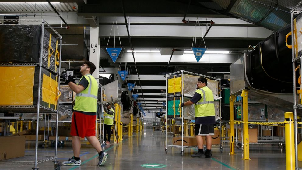 Amazon to mandate masks for all its workers in
warehouses 1