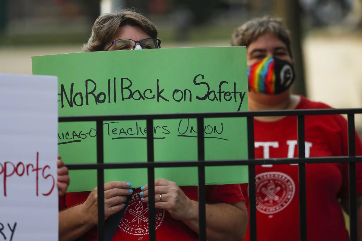 Chicago Teachers Union calls on mayor to ‘get serious’ about
an agreement to reopen schools with students due back in a
week 1