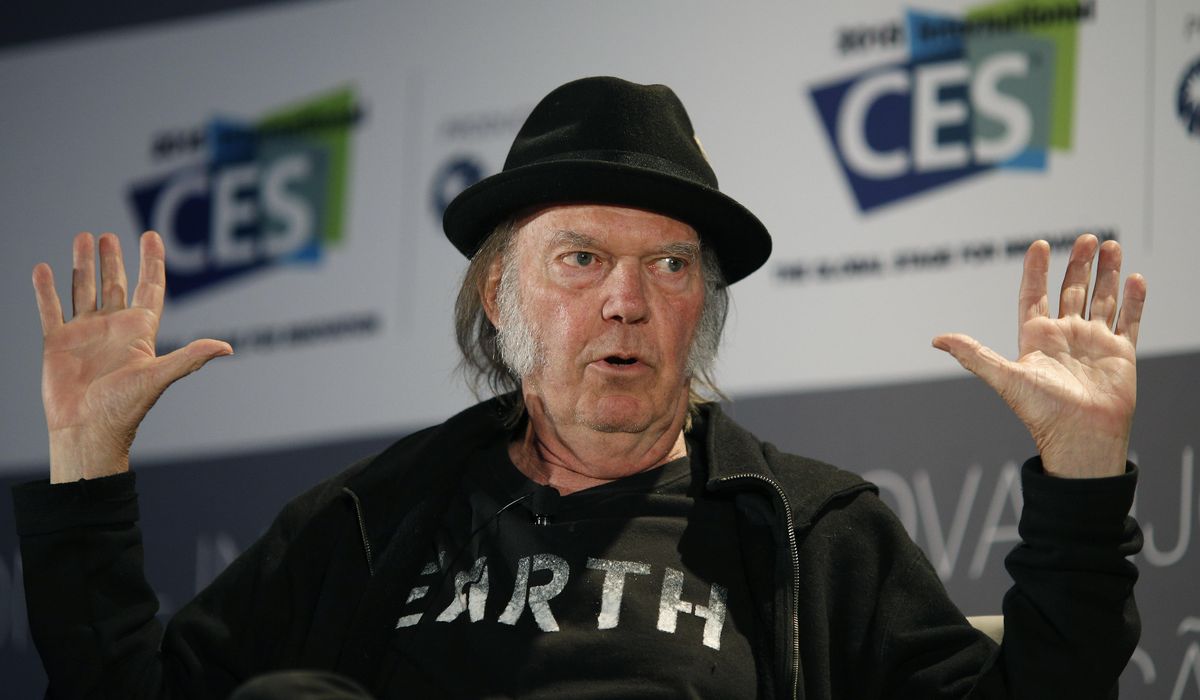 Neil Young says concerts are COVID-19 'super spreaders,'
accuses promoters of prioritizing profits 1