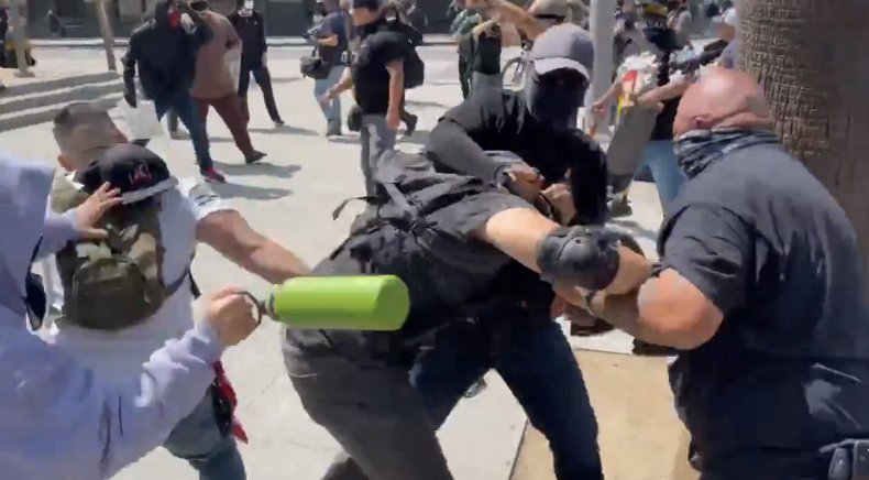 Brawls Break Out at Los Angeles Protest Against COVID
Vaccination 'Tyranny' 1