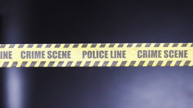 Person shot dead in front of La Habra police headquarters;
officer wounded 1