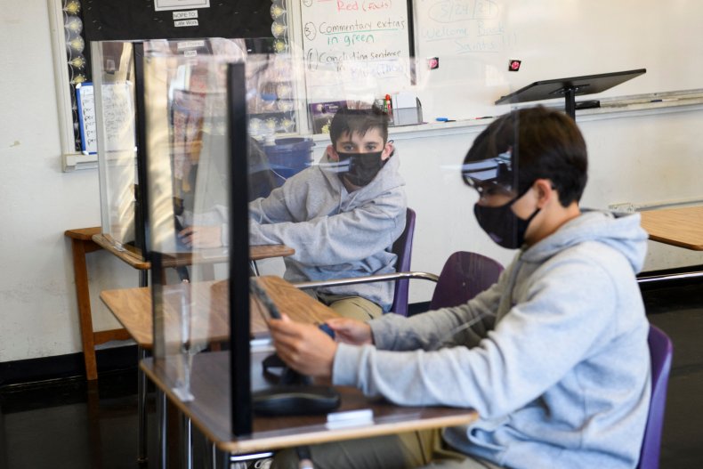 Education Secretary Cardona Supports Mask Wearing as Schools
Reopen: 'Let's Do What Works' 1