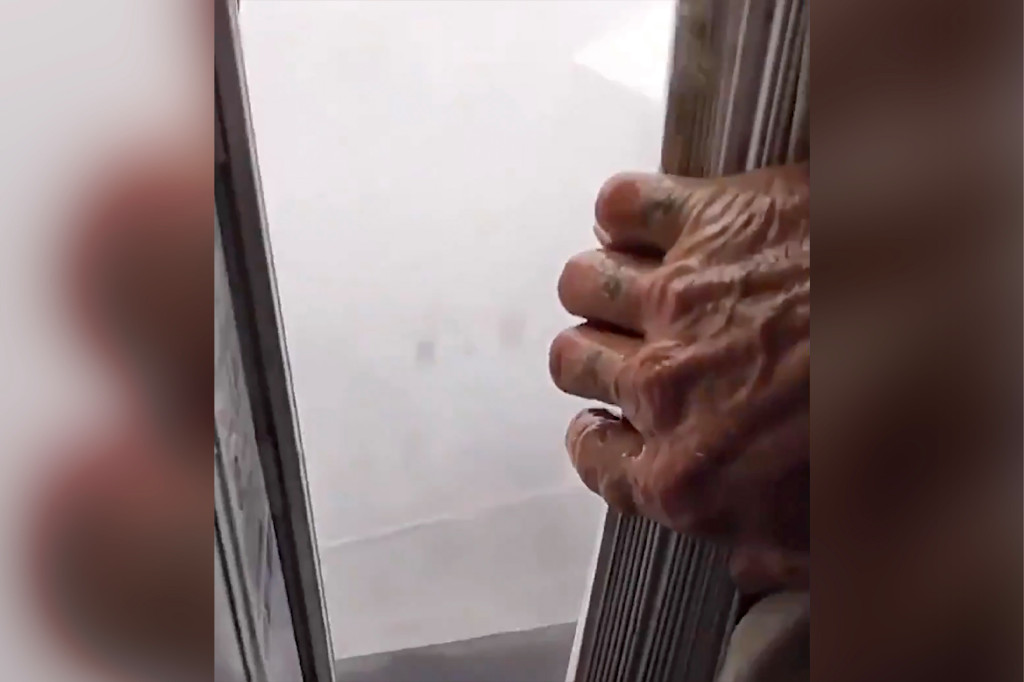 Viral video shows Louisiana man opening window as Hurricane
Ida rages on 1