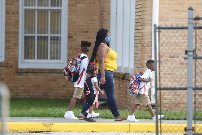 Florida School District Drops Mask Mandate Opt-Out in More
Defiance of DeSantis 1