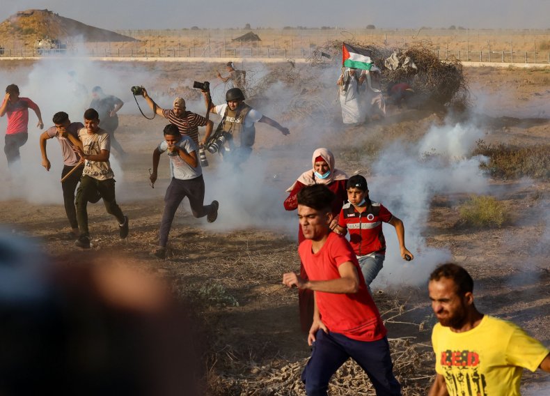 Israeli Military Uses Tear Gas, Live Fire to Disburse
Palestinian Protests Near Border 1