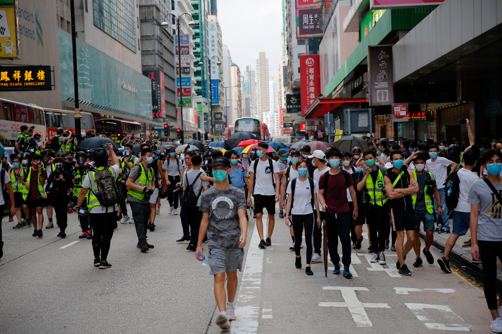 Hong Kong protest group disbands under government
pressure 1