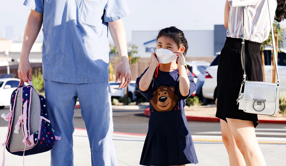 Delaware governor orders masks in public and private
schools 1