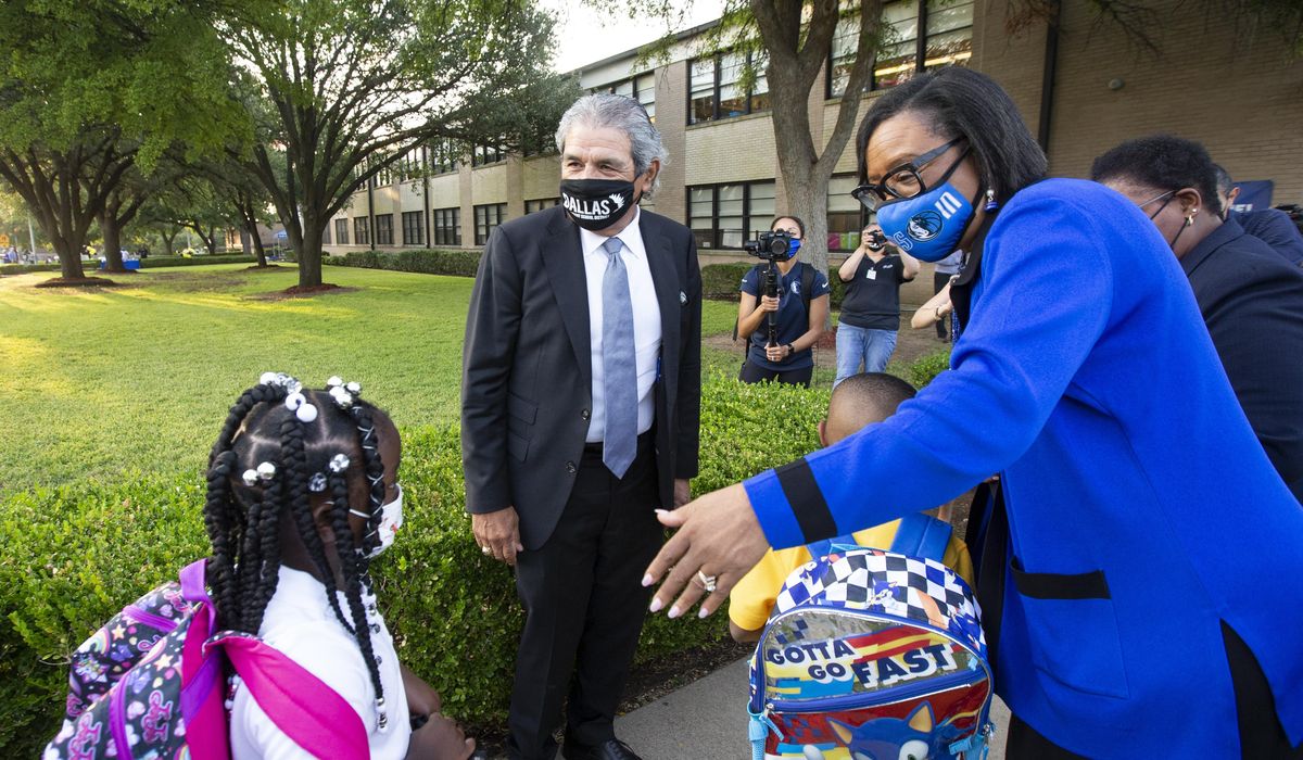 Dallas school district defies Texas Gov. Greg Abbott, court
ruling on COVID-19 masks 1