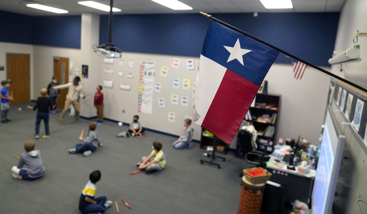 Texas school district sees loophole in Gov. Greg Abbott's
ban, adds masks to dress code 1