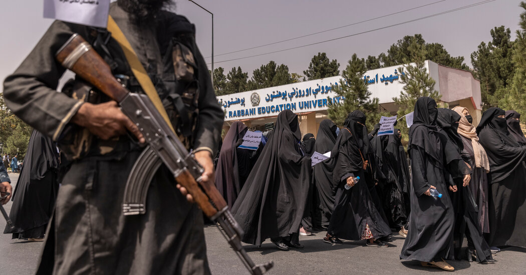 At Pro-Taliban Protest, a Symbol of America’s Lost
Influence: Hundreds Dressed in Burqas 1