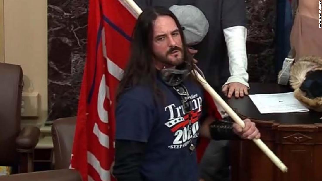 US Capitol rioter who stormed Senate floor reports to prison
while trying to undo his felony guilty plea 1