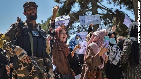 Taliban fire into the air to break up Kabul's largest street
protests yet 1