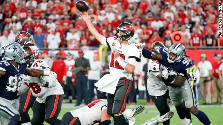 Brady and defending champion Tampa Bay Buccaneers beat
Dallas Cowboys in season opener 1 Brady and defending champion Tampa Bay Buccaneers beat
Dallas Cowboys in season opener 1