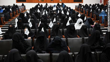 Afghan women share photos of dresses to protest Taliban's
black hijab mandate 1