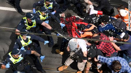 Hundreds of anti-lockdown protesters clash with police in
Australia 1