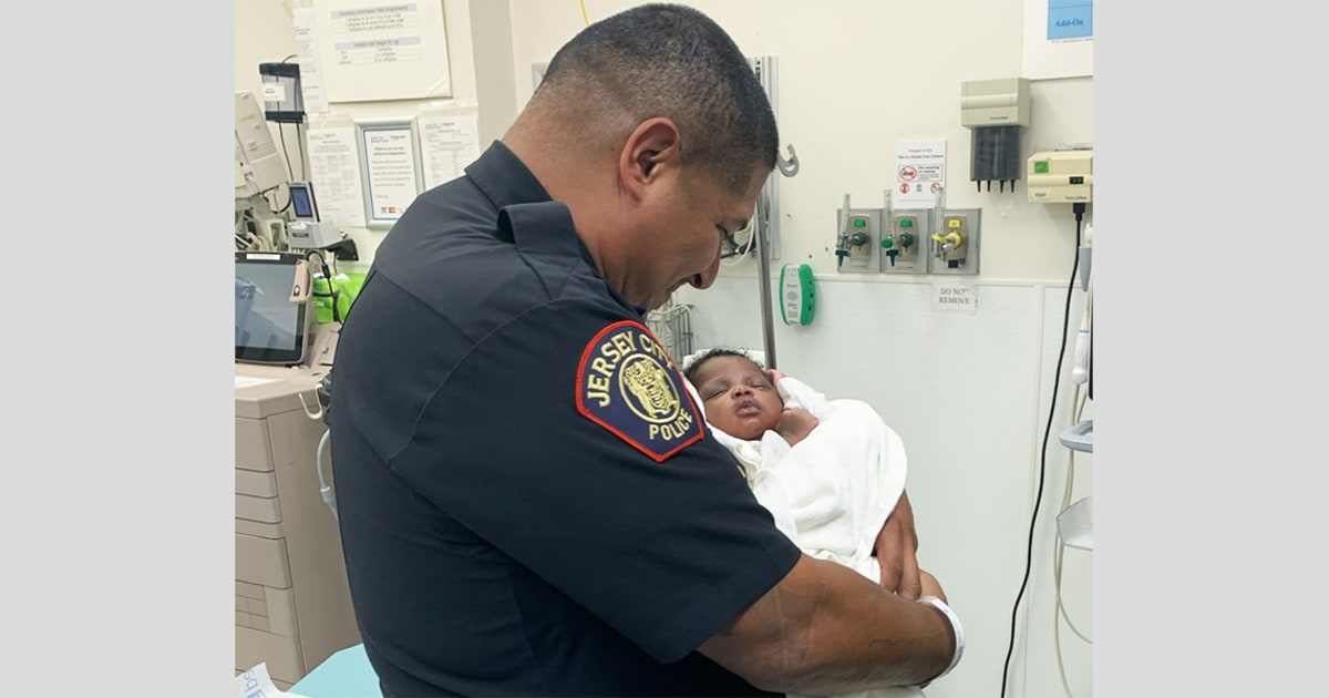 New Jersey officer catches 1-month-old baby thrown from 2nd
floor balcony 1