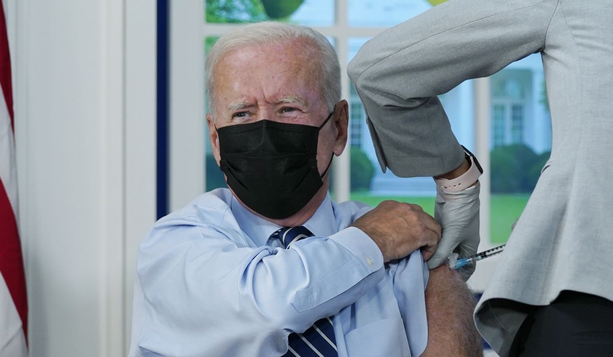 Joe Biden gets a COVID-19 booster shot in front of
cameras 1