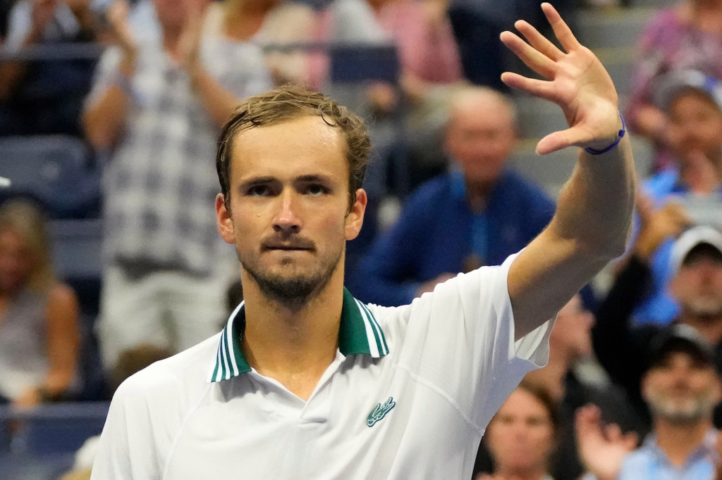 Going from villain to hero, Daniil Medvedev rolls on at US
Open 1