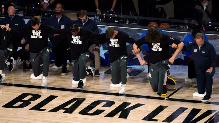 A Boston reporter and a Celtics executive remember NBA’s day
of protest 1