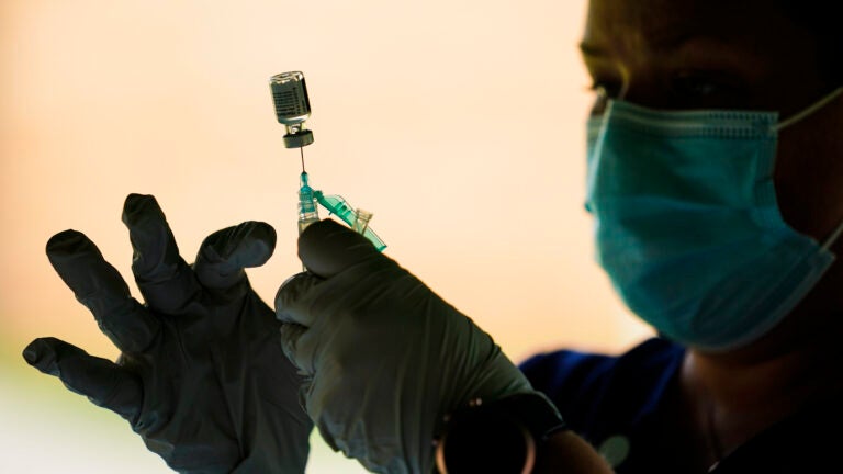 CDC panel grapples with who needs a COVID-19 booster
shot 1