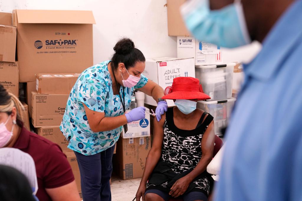Colorado to open four new mass COVID-19 vaccination
sites 1