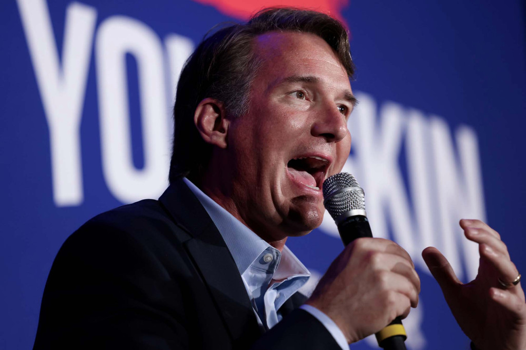 As he vies to lead Virginia again, McAuliffe caught flouting
mask mandate 1
