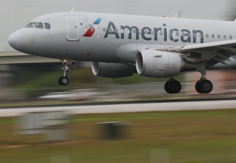 American Airlines Passenger Opens Plane's Emergency Door,
Jumps on to Wing 1