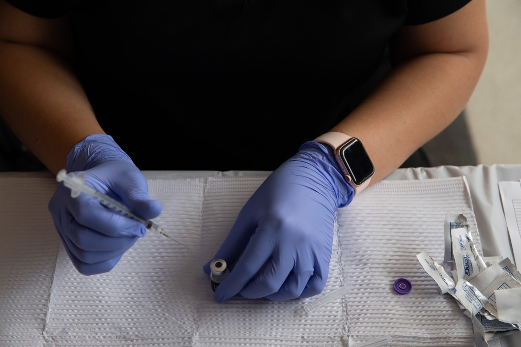 COVID-19 vaccine third shot side effects on par with second
dose: CDC study 1