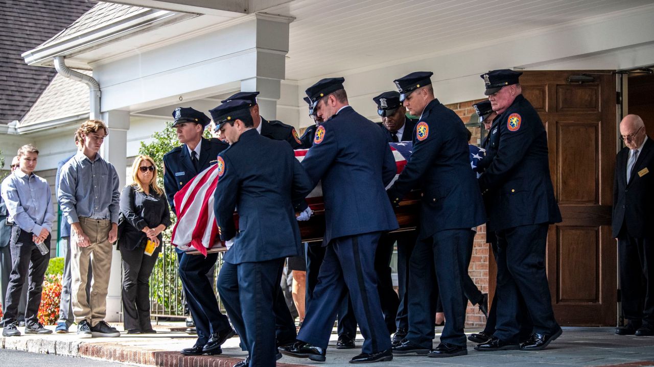 Sea of blue, family and friends say goodbye to Charles
Vroom, officer who died from COVID-19 1