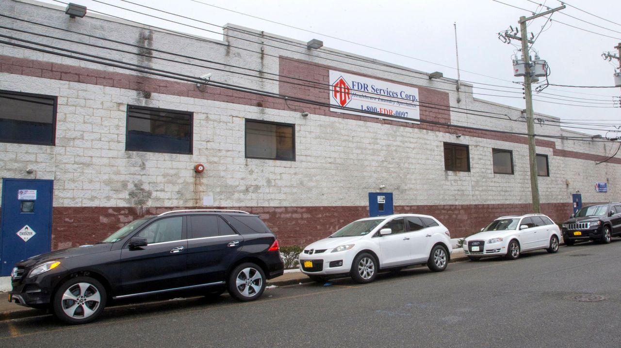 Settlement reached in case of fired laundry workers, state
Attorney General's office says 1