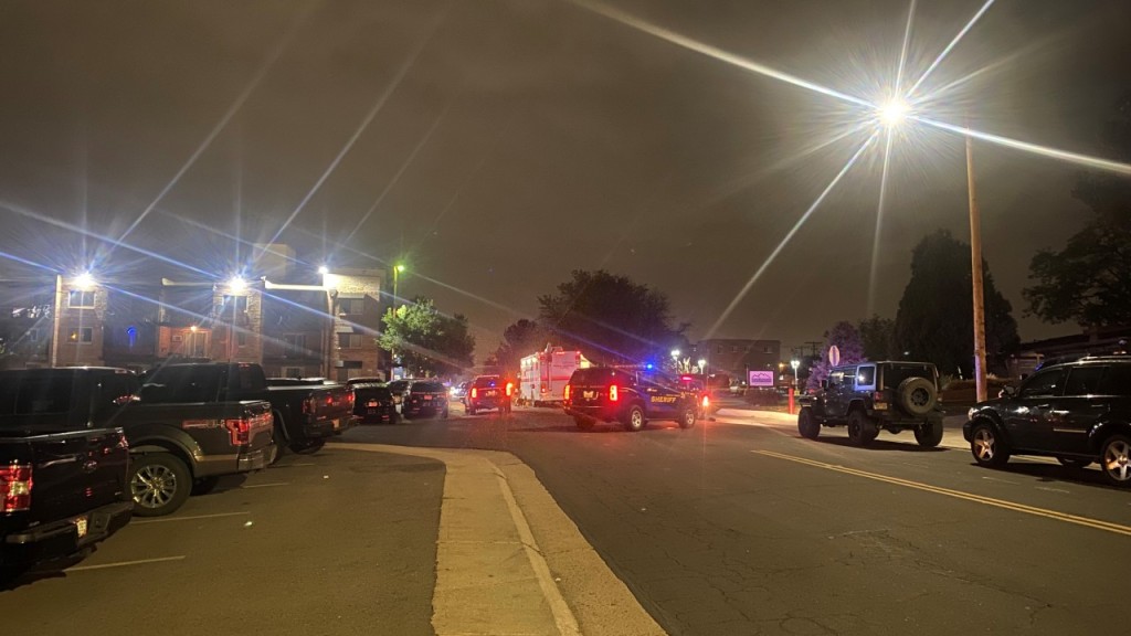 Littleton police officer shot multiple times, search
underway for suspect 1