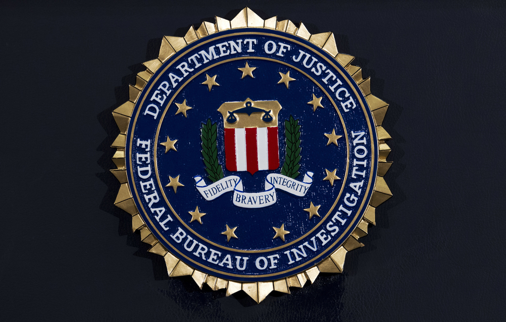 Man hired to clean FBI office stole valuable investigation
materials on street gangs, feds say 1