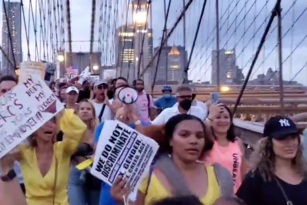 Protesters object to NYC vaccine mandates in march across
Brooklyn Bridge 1