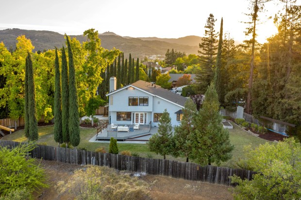 4-bedroom Almaden home with mountain views, terrific
sunsets, privacy, top schools and room for a pool and ADU 1