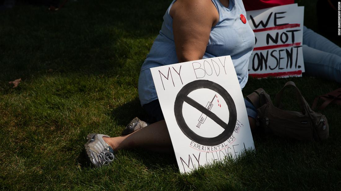 Some Michigan health departments back off mask and
quarantine orders after GOP budget provision targets their
funding 1