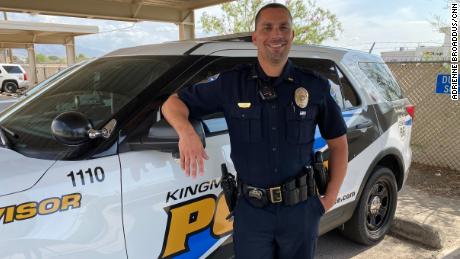 The police officer took a bruised toddler from an abusive
home. She took his heart. 1