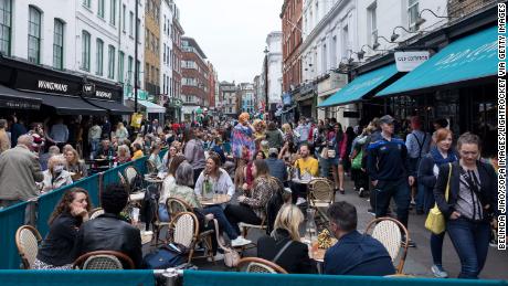 The Prime Minister urged Britons to 'learn to live with this
virus,' as Covid-19 restrictions were lifted and the deadly Delta
variant continued to spread 1