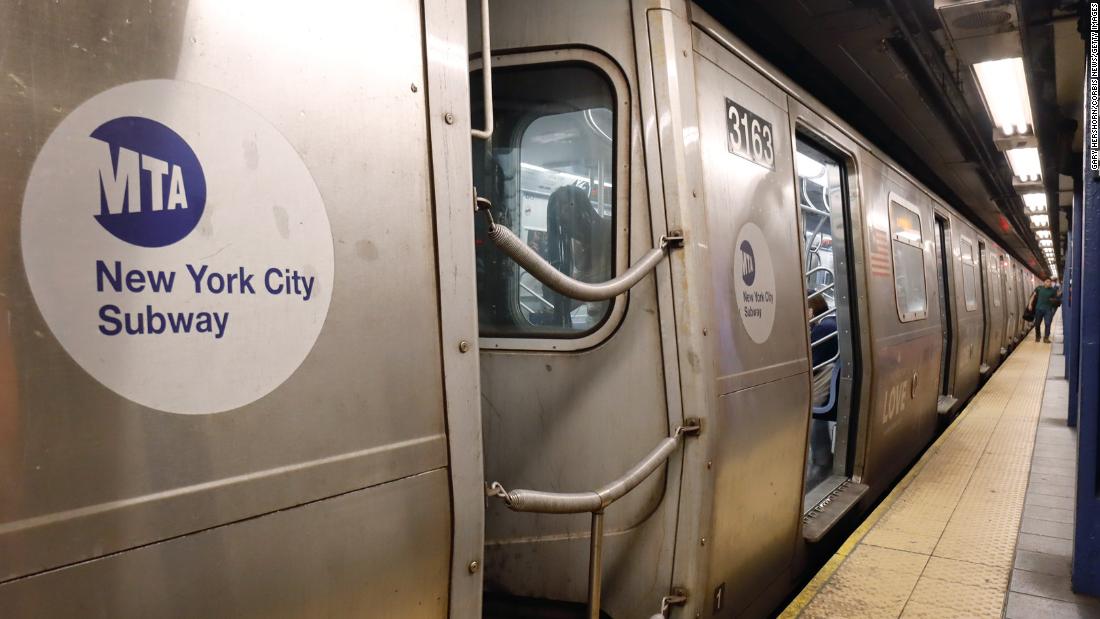 NYC mayor 'troubled' by video showing unmasked officers
forcibly removing masked subway commuter 1