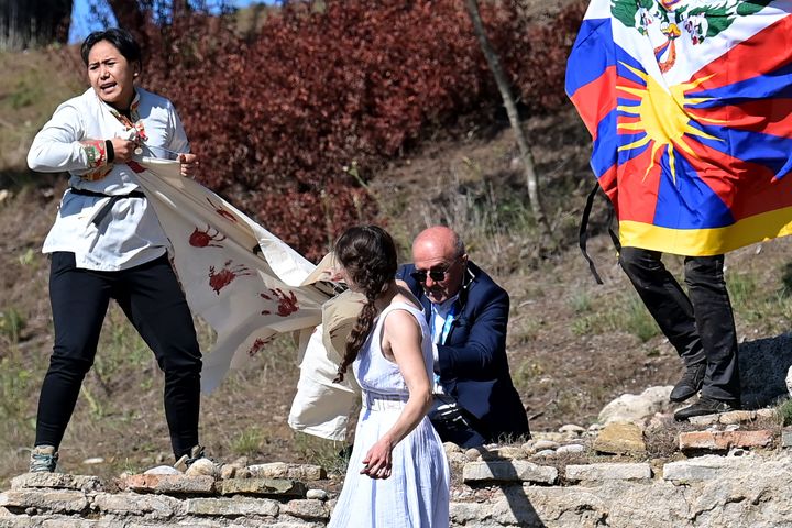 Protesters Disrupt Torch Lighting For Beijing Winter
Olympics 1