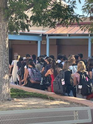 'We are one': New Mexico school comes together to support a
classmate bullied for wearing a hijab 1