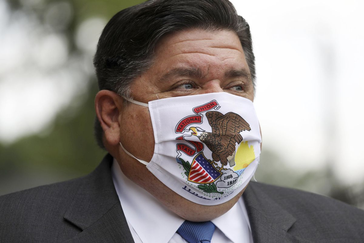 Gov. J.B. Pritzker says he’s waiting for further decline in
COVID-19 transmission before lifting indoor mask mandate 1 Gov. J.B. Pritzker says he’s waiting for further decline in
COVID-19 transmission before lifting indoor mask mandate 1