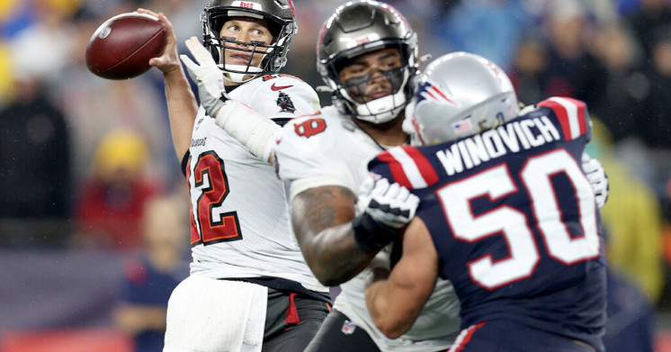 Tom Brady beats Patriots, sets passing yards record in New
England return 1