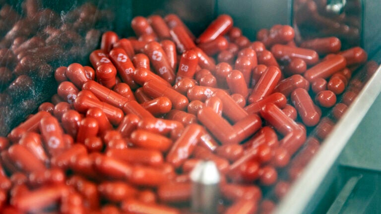 Merck says experimental pill cuts worst effects of
COVID-19 1