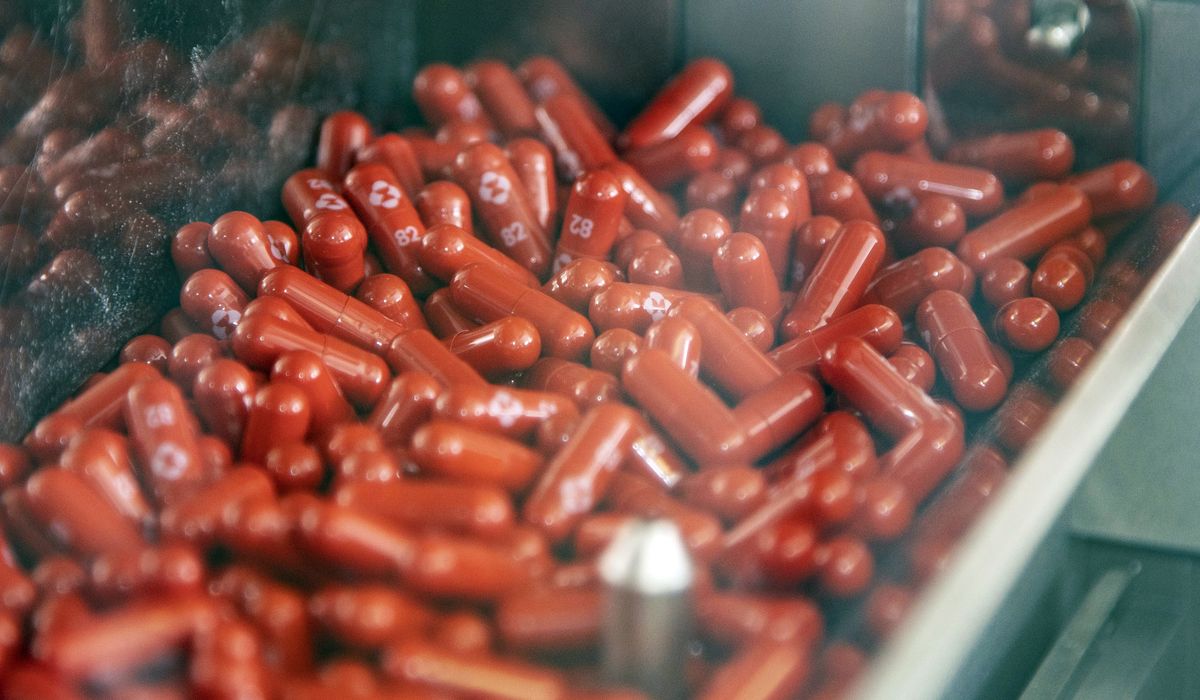 Merck says experimental pill cuts worst effects of
COVID-19 1