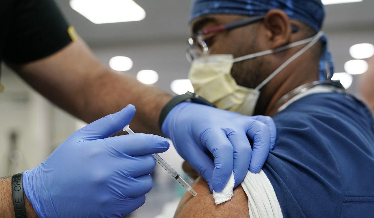 FDA eyeing plan to allow mix-and-match of COVID-19 vaccine
booster: Report 1